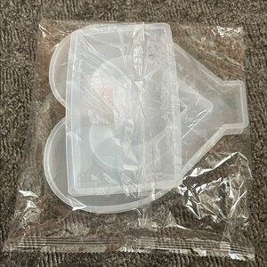 Silicone molds, heart and light switch cover, new in sealed bag